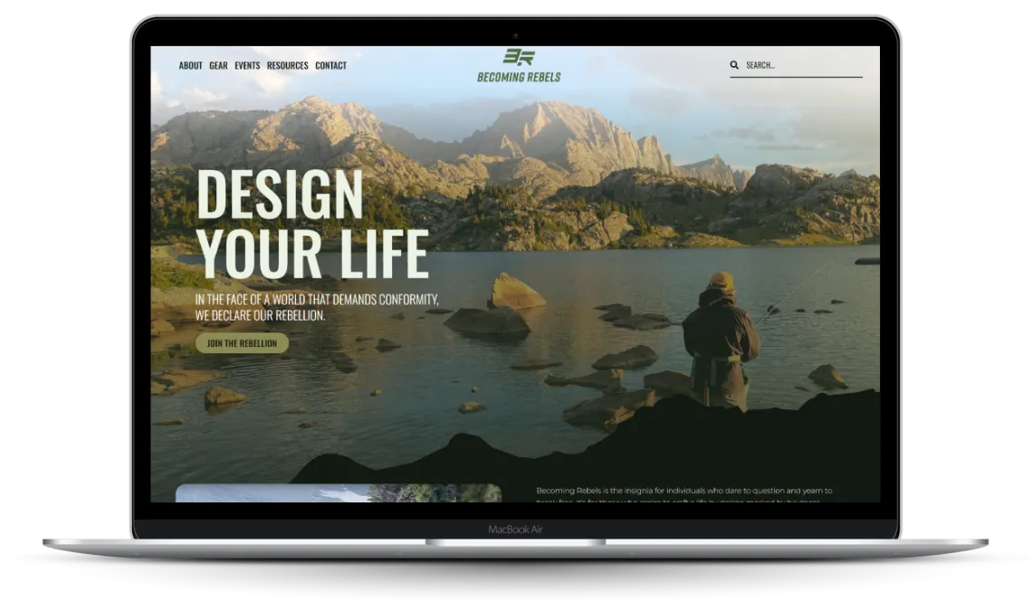 Laptop displaying serene lake scene with "Design Your Life" text overlay.