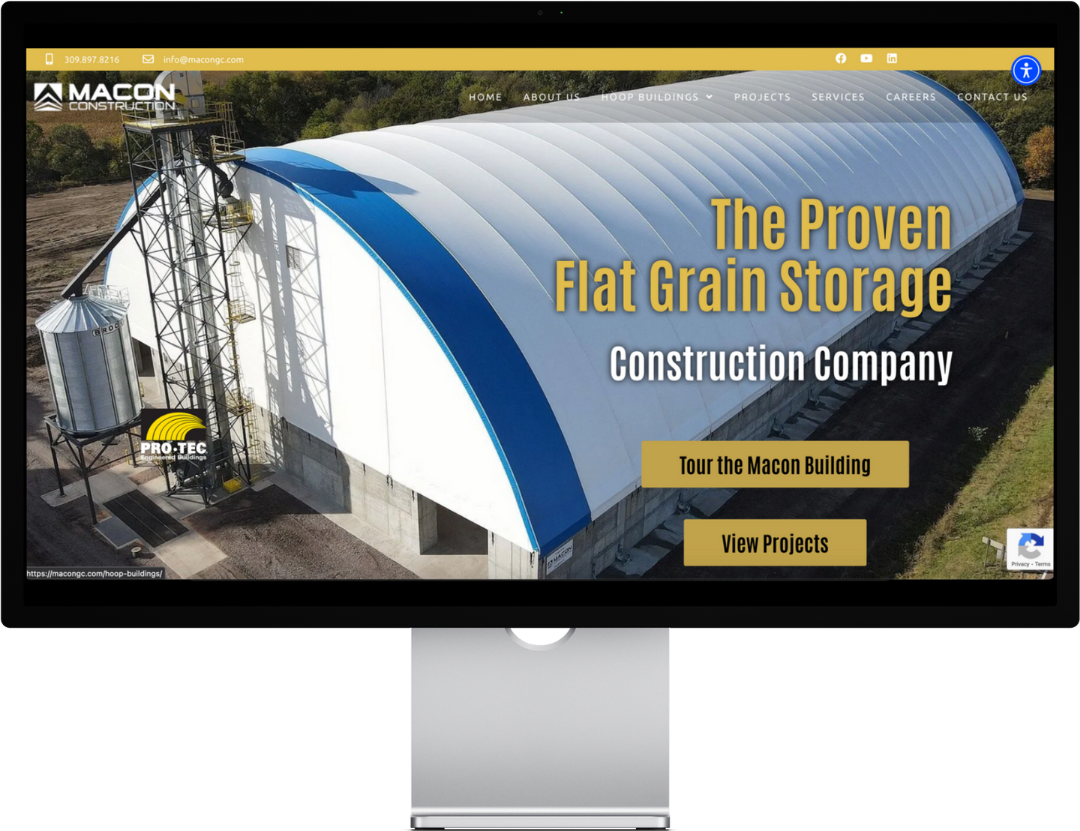 Computer screen displaying a grain storage building with Macon Construction logo.