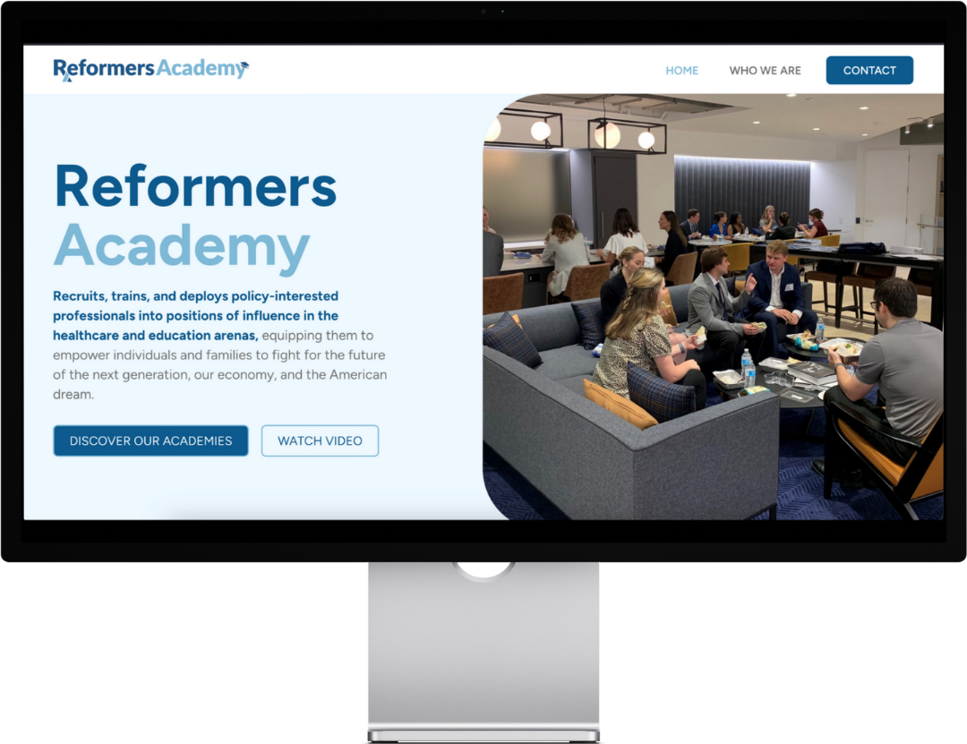 People conversing in modern office, blue-gray tones; "Reformers Academy" text visible.