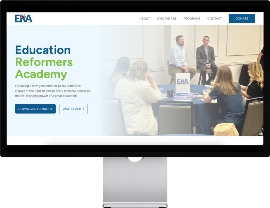 Website screenshot of Education Reformers Academy meeting with seated participants and speakers.