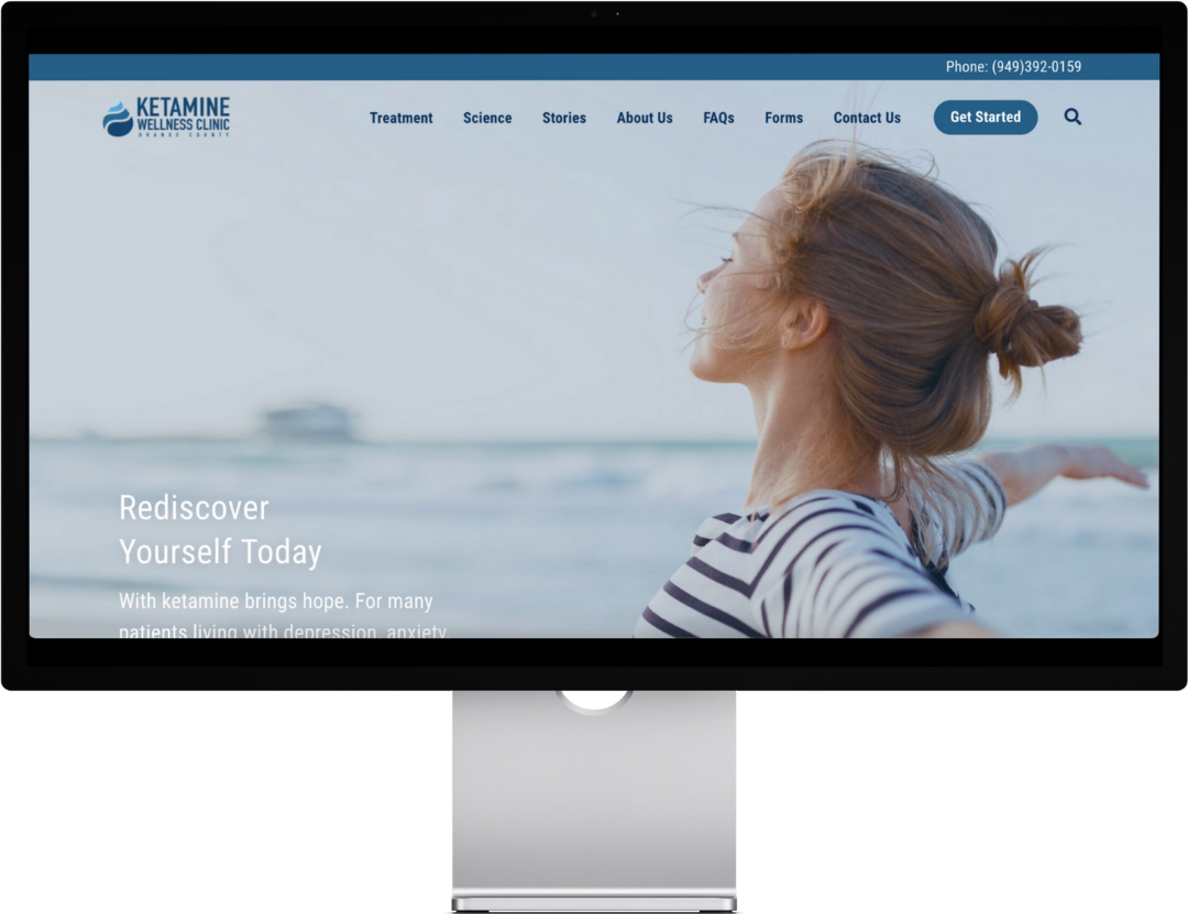 Woman with outstretched arms by ocean, striped shirt, website screenshot, "Rediscover Yourself Today."