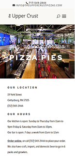 Restaurant interior photo with text overlay "Upper Crust" and "PIZZA PIES."